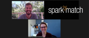 Zoom screenshot of two tiles. Top left tile is a man with brown hair and beard wearing a grey shirt. Top right is the Spark logo saying Spark Match. Bottom centre tiles has a women with short brown hair, glasses, and a dark shirt. Both people are looking and smiling at the camera